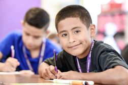 elementary student studying at desk